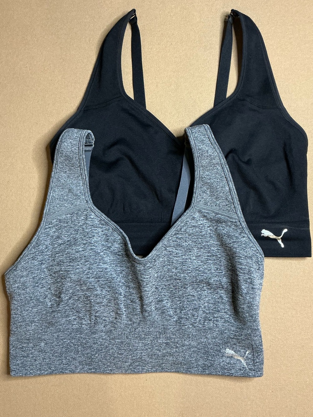 Two Puma sports bras